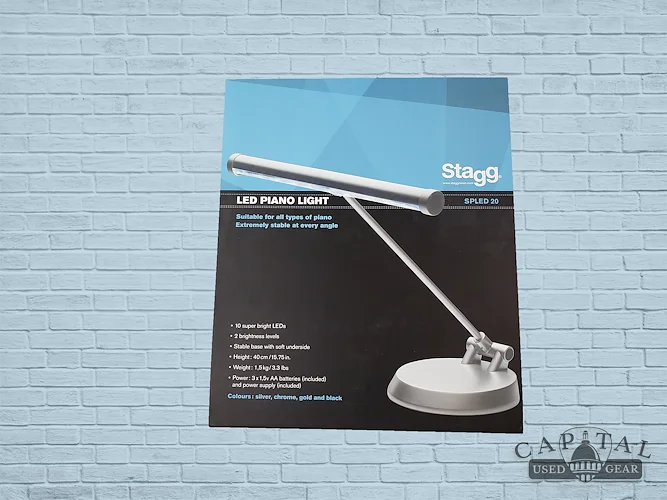 Black battery-powered or mains-operated LED piano or desk lamp (Used)